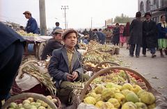 42 Kashgar Sunday Market 1993 Young Boy Selling Vegetables.jpg